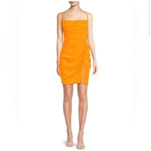 Amanda Unprichard Orange mini Dress with a slit and open back